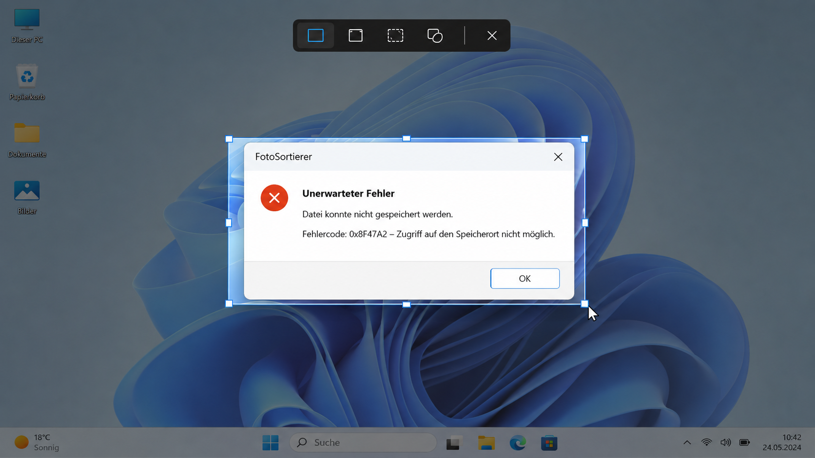 Windows-Bildschirm mit markiertem Bereich um eine Fehlermeldung für einen Screenshot